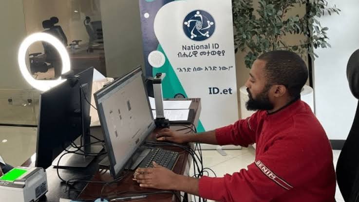 A professional working at a digital identity service desk